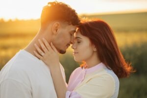 Couple embracing at sunset