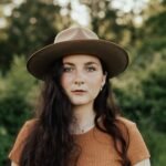 Portrait of a woman in a brown hat